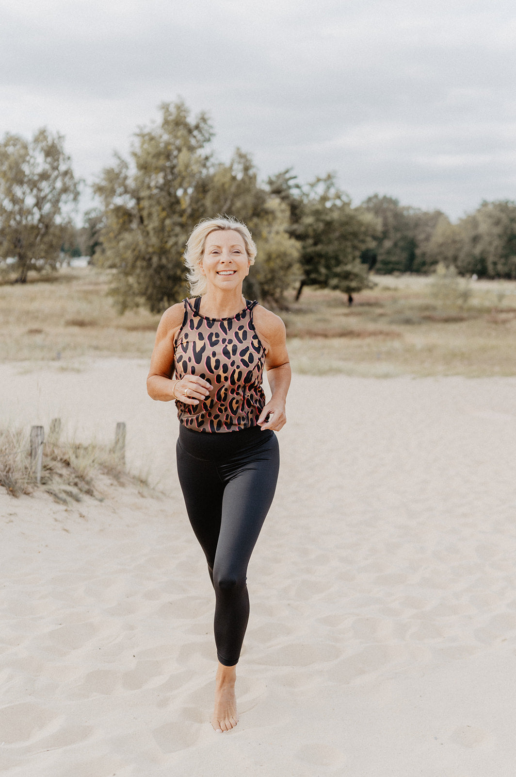 Jumpsuit Active Schwarz mit Safari Gold